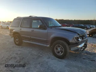 1997 Ford Explorer XL with VIN 1FMDU34XXVUC61582, listed as a Copart auction lot 81957344 with 153,852 mi miles and Salvage title. Bid and sale history available at DreamBid. Image 4.