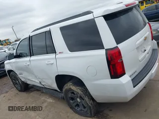 2017 Chevrolet Tahoe LT with VIN 1GNSKBKC1HR401044, listed as a IAAI auction lot 41573362 with 103,865 mi miles and . Bid and sale history available at DreamBid. Image 14.