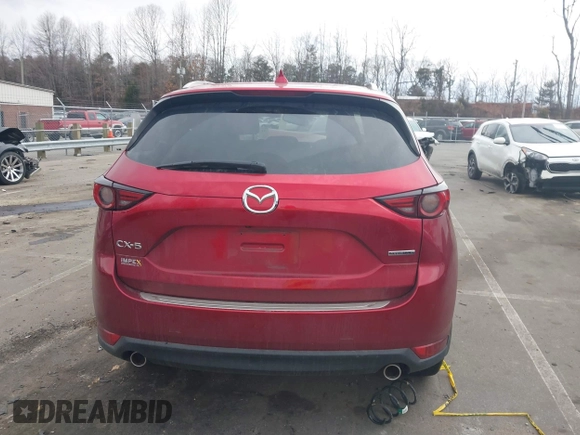 2020 Mazda CX-5 Grand Touring with VIN JM3KFADMXL0842026, listed as a IAAI auction lot 41477339 with 60,755 mi miles. Bid and sale history available at carsss.com. Image 16.