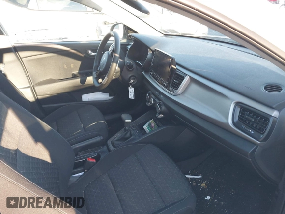 2022 Kia Rio S with VIN 3KPA25AD5NE443465, listed as a IAAI auction lot 41230852 with 20,460 mi miles and . Bid and sale history available at DreamBid. Image 5.