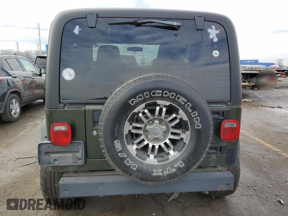 2006 Jeep Wrangler SE with VIN 1J4FA29156P773474, listed as a Copart auction lot 84457164 with 187,462 mi miles and Clean Title. Bid and sale history available at carsss.com. Image 6.