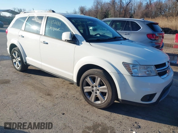 2013 Dodge Journey Crew with VIN 3C4PDCDG3DT521556, listed as a IAAI auction lot 41852888 with 209,562 mi miles and . Bid and sale history available at DreamBid. Image 1.