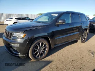 2020 Jeep Grand Cherokee Overland with VIN 1C4RJFCG7LC210310, listed as a Copart auction lot 54117165 with 103,648 mi miles and Salvage title. Bid and sale history available at DreamBid. Image 1.