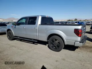2012 Ford F-150 XL with VIN 1FTFW1CT1CFC35724, listed as a Copart auction lot 49000095 with 209,713 mi miles and Salvage Title. Bid and sale history available at carsss.com. Image 2.