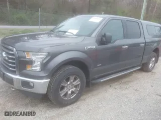 2015 Ford F-150 XLT w/HD Payload Pkg with VIN 1FTFW1EG6FFA46006, listed as a IAAI auction lot 41942359 with 144,221 mi miles. Bid and sale history available at carsss.com. Image 2.