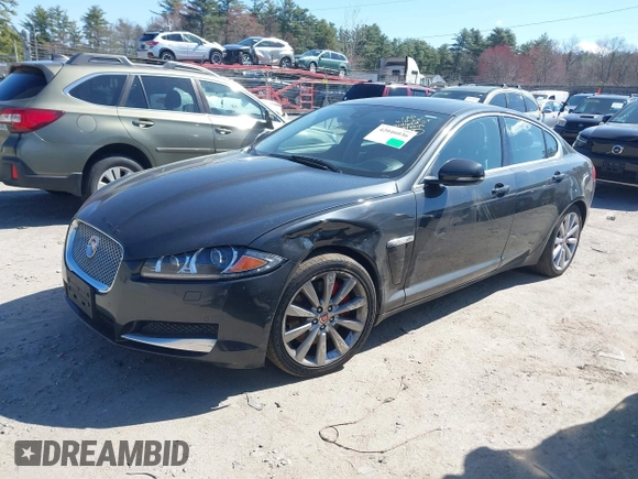 2014 Jaguar XF V6 SC with VIN SAJWJ0EF9E8U31032, listed as a IAAI auction lot 42046036 with 118,927 mi miles. Bid and sale history available at carsss.com. Image 2.