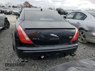 2014 Jaguar XJ with VIN SAJWA2EKXEMV64494, listed as a Copart auction lot 82634004 with 119,811 mi miles and Clean title. Bid and sale history available at DreamBid. Image 6.