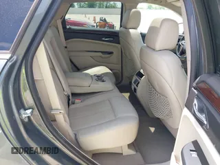 2013 Cadillac SRX Luxury Collection z VIN 3GYFNCE39DS542125, wystawiony jako IAAI lot #42067672 z przebiegiem 158 013 mil mil oraz . Historia ofert i sprzedaży dostępna na DreamBid. Obrazek 8.