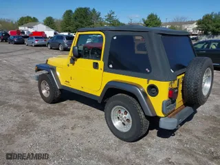 2004 Jeep Wrangler X with VIN 1J4FA39S84P800291, listed as a IAAI auction lot 41975648 with 205,402 mi miles. Bid and sale history available at carsss.com. Image 3.