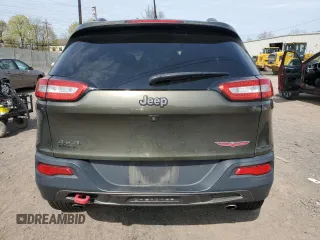 2015 Jeep Cherokee Trailhawk with VIN 1C4PJMBSXFW687205, listed as a Copart auction lot 53128545 with 86,876 mi miles and Salvage Title. Bid and sale history available at carsss.com. Image 6.