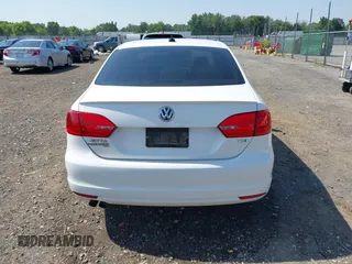 2014 Volkswagen Jetta TDI w/Premium/Nav with VIN 3VWLL7AJXEM366828, listed as a IAAI auction lot 42392563 with 132,924 mi miles and . Bid and sale history available at DreamBid. Image 16.
