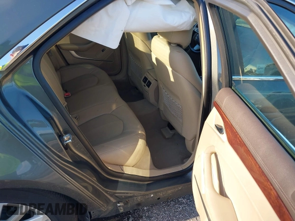 2011 Cadillac CTS Luxury with VIN 1G6DE5EY5B0154563, listed as a IAAI auction lot 36806985 with 92,635 mi miles and . Bid and sale history available at DreamBid. Image 8.