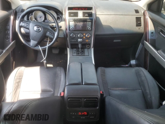 2014 Mazda CX-9 Grand Touring with VIN JM3TB3DV9E0444720, listed as a Copart auction lot 63687855 with 144,568 mi miles and Salvage title. Bid and sale history available at DreamBid. Image 8.