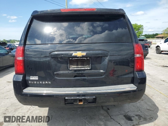 2015 Chevrolet Suburban LTZ with VIN 1GNSCKKC9FR151532, listed as a Copart auction lot 54209315 with 122,380 mi miles and Salvage title. Bid and sale history available at DreamBid. Image 6.