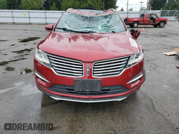 2015 Lincoln MKC z VIN 5LMTJ2AHXFUJ10820, wystawiony jako Copart lot #57139315 z przebiegiem 128 714 mil mil oraz Szkody całkowita. Historia ofert i sprzedaży dostępna na DreamBid. Obrazek 5.