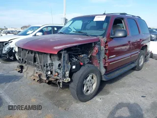 2003 Chevrolet Tahoe LT with VIN 1GNEC13Z33R261062, listed as a IAAI auction lot 41882613 with Not provided miles and . Bid and sale history available at DreamBid. Image 2.