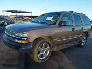 2004 Chevrolet Tahoe LT with VIN 1GNEC13ZX4R235169, listed as a IAAI auction lot 40823137 with 204,957 mi miles. Bid and sale history available at carsss.com. Image 2.