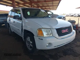2004 GMC Envoy SLT with VIN 1GKDS13S442217242, listed as a IAAI auction lot 42573887 with 210,296 mi miles and . Bid and sale history available at DreamBid. Image 1.