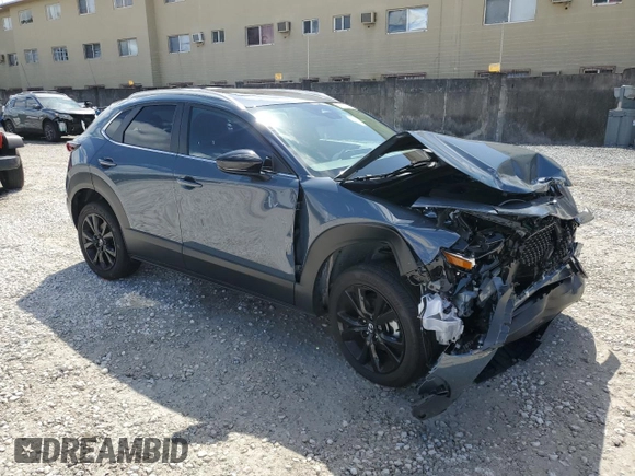 2024 Mazda CX-30 2.5 S Carbon Edition with VIN 3MVDMBCMXRM673483, listed as a Copart auction lot 46810935 with 3,047 mi miles and Salvage Title. Bid and sale history available at carsss.com. Image 4.
