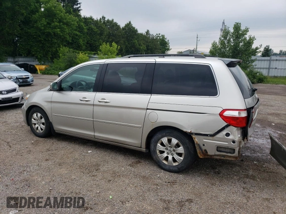 2007 Honda Odyssey EX with VIN 5FNRL38427B513477, listed as a Copart auction lot 62457695 with 216,977 mi miles and Salvage title. Bid and sale history available at DreamBid. Image 2.