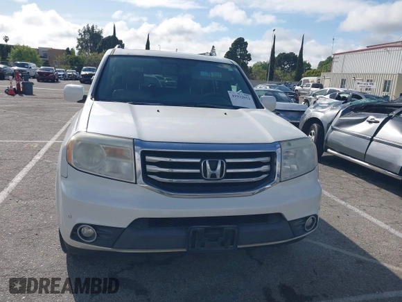 2015 Honda Pilot Touring with VIN 5FNYF3H93FB007766, listed as a IAAI auction lot 41932052 with 131,036 mi miles. Bid and sale history available at carsss.com. Image 12.
