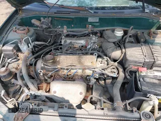 1998 Mitsubishi Mirage DE z VIN JA3AY26A2WU001675, wystawiony jako IAAI lot #42484995 z przebiegiem 89 680 mil mil oraz . Historia ofert i sprzedaży dostępna na DreamBid. Obrazek 10.