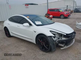 2019 Tesla Model 3 Mid Range with VIN 5YJ3E1EA8KF472540, listed as a IAAI auction lot 41661312 with 75,575 mi miles and . Bid and sale history available at DreamBid. Image 1.