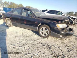 2002 Mazda Millenia z VIN JM1TA221021729625, wystawiony jako Copart lot #87304234 z przebiegiem 88 376 mil mil oraz Szkody całkowita. Historia ofert i sprzedaży dostępna na DreamBid. Obrazek 4.
