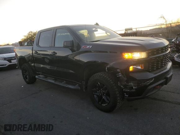 2021 Chevrolet Silverado 1500 Custom Trail Boss with VIN 3GCPYCEF6MG104130, listed as a Copart auction lot 82775624 with 62,408 mi miles and Salvage Title. Bid and sale history available at DreamBid. Image 4.