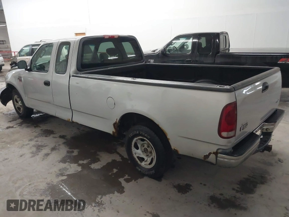 2002 Ford F-150 XL with VIN 1FTRX17W52NB23883, listed as a IAAI auction lot 41721680 with 144,115 mi miles. Bid and sale history available at carsss.com. Image 3.