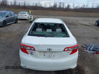 2014 Toyota Camry L with VIN 4T4BF1FKXER374901, listed as a IAAI auction lot 41861839 with 130,990 mi miles and . Bid and sale history available at DreamBid. Image 6.
