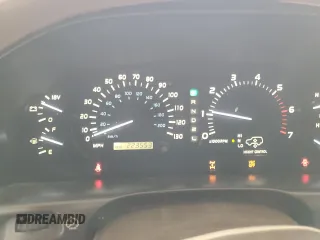 2001 Lexus LX 470 z VIN JTJHT00W113505721, wystawiony jako Copart lot #56463665 z przebiegiem 223 553 mil mil oraz Szkody całkowita. Historia ofert i sprzedaży dostępna na DreamBid. Obrazek 9.