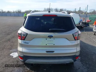 2017 Ford Escape Titanium with VIN 1FMCU0JD3HUB19602, listed as a IAAI auction lot 41816296 with 70,311 mi miles. Bid and sale history available at carsss.com. Image 16.