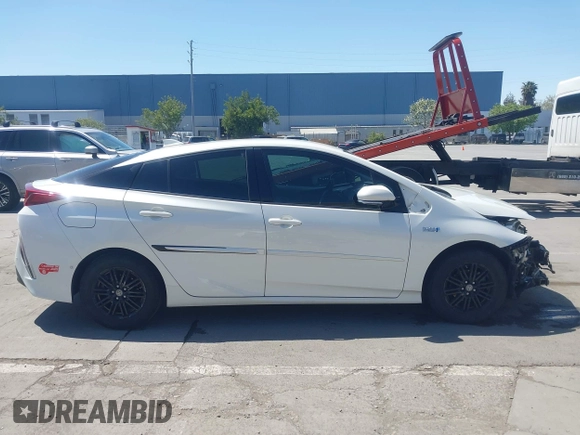 2017 Toyota Prius Plus with VIN JTDKARFP6H3038924, listed as a IAAI auction lot 42028326 with 116,012 mi miles and . Bid and sale history available at DreamBid. Image 14.