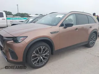 2025 Mazda CX-70 Premium Plus with VIN JM3KJEHA1S1111323, listed as a IAAI auction lot 42109316 with 561 mi miles and . Bid and sale history available at DreamBid. Image 2.