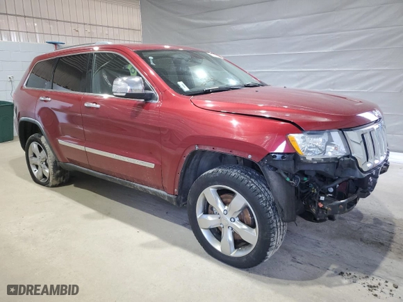 2012 Jeep Grand Cherokee Overland with VIN 1C4RJFCT8CC171384, listed as a Copart auction lot 48164355 with 213,848 mi miles and Salvage Title. Bid and sale history available at carsss.com. Image 4.