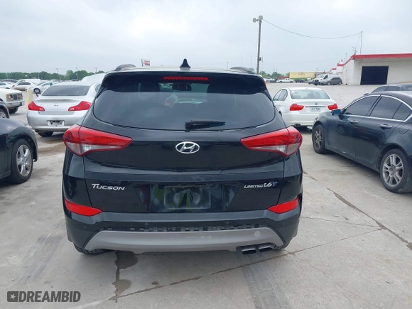 2017 Hyundai Tucson Value with VIN KM8J33A26HU362363, listed as a IAAI auction lot 41940376 with 127,986 mi miles. Bid and sale history available at carsss.com. Image 16.
