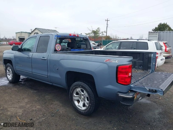 2015 Chevrolet Silverado 1500 LT with VIN 1GCVKREC1FZ330239, listed as a IAAI auction lot 41672993 with 87,766 mi miles. Bid and sale history available at carsss.com. Image 3.