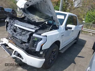 2023 Ford F-150 Lightning Pro z VIN 1FTVW1EV1PWG17610, wystawiony jako IAAI lot #41929636 z przebiegiem 44 428 mil mil oraz . Historia ofert i sprzedaży dostępna na DreamBid. Obrazek 22.