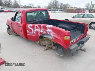 2003 Mazda B-Series Truck SX with VIN 4F4YR12D03TM14307, listed as a IAAI auction lot 41808811 with 153,476 mi miles and . Bid and sale history available at DreamBid. Image 3.