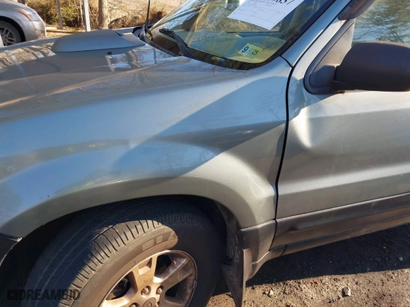 2007 Ford Escape XLT with VIN 1FMYU03147KA04848, listed as a IAAI auction lot 41699837 with 170,356 mi miles. Bid and sale history available at carsss.com. Image 6.