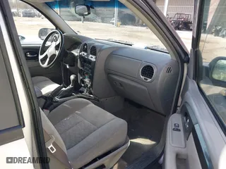 2005 GMC Envoy SLE with VIN 1GKDS13S252284455, listed as a IAAI auction lot 41455172 with 171,559 mi miles. Bid and sale history available at carsss.com. Image 5.