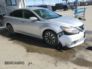 2018 Nissan Altima SV with VIN 1N4AL3AP8JC207041, listed as a Copart auction lot 51521575 with 127,482 mi miles and Salvage Title. Bid and sale history available at DreamBid. Image 4.