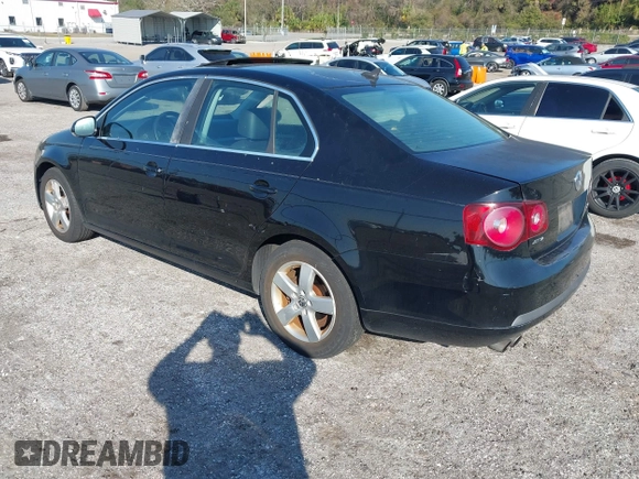 2008 Volkswagen Jetta Sedan SE with VIN 3VWRM71KX8M182235, listed as a IAAI auction lot 41519055 with 182,404 mi miles. Bid and sale history available at carsss.com. Image 3.