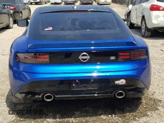 2023 Nissan Z Performance z VIN JN1BZ4BH4PM312028, wystawiony jako Copart lot #69381994 z przebiegiem 7788 mil mil oraz Szkody całkowita. Historia ofert i sprzedaży dostępna na DreamBid. Obrazek 6.