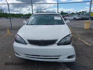 2002 Toyota Camry XLE z VIN 4T1BF30K72U500934, wystawiony jako IAAI lot #42312967 z przebiegiem 169 569 mil mil oraz . Historia ofert i sprzedaży dostępna na DreamBid. Obrazek 12.