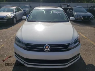 2015 Volkswagen Jetta SE z VIN 3VWD07AJ8FM224623, wystawiony jako Copart lot #62408765 z przebiegiem 142 827 mil mil oraz Czysty tytuł • Clean title. Historia ofert i sprzedaży dostępna na DreamBid. Obrazek 5.