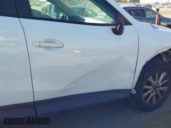 2013 Mazda CX-5 Sport with VIN JM3KE2BE4D0153251, listed as a IAAI auction lot 42297235 with 177,019 mi miles and . Bid and sale history available at DreamBid. Image 19.