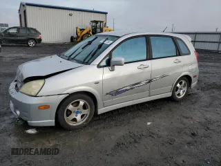 2004 Suzuki Aerio SX z VIN JS2RC61HX45253671, wystawiony jako Copart lot #85587754 z przebiegiem 171 436 mil mil oraz Szkoda całkowita • Salvage title. Historia ofert i sprzedaży dostępna na DreamBid. Obrazek 1.