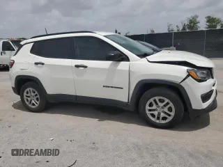 2018 Jeep Compass Sport with VIN 3C4NJCAB1JT461958, listed as a Copart auction lot 59567105 with 181,632 mi miles and Salvage title. Bid and sale history available at DreamBid. Image 4.